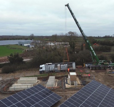A crane unloading a lorry
